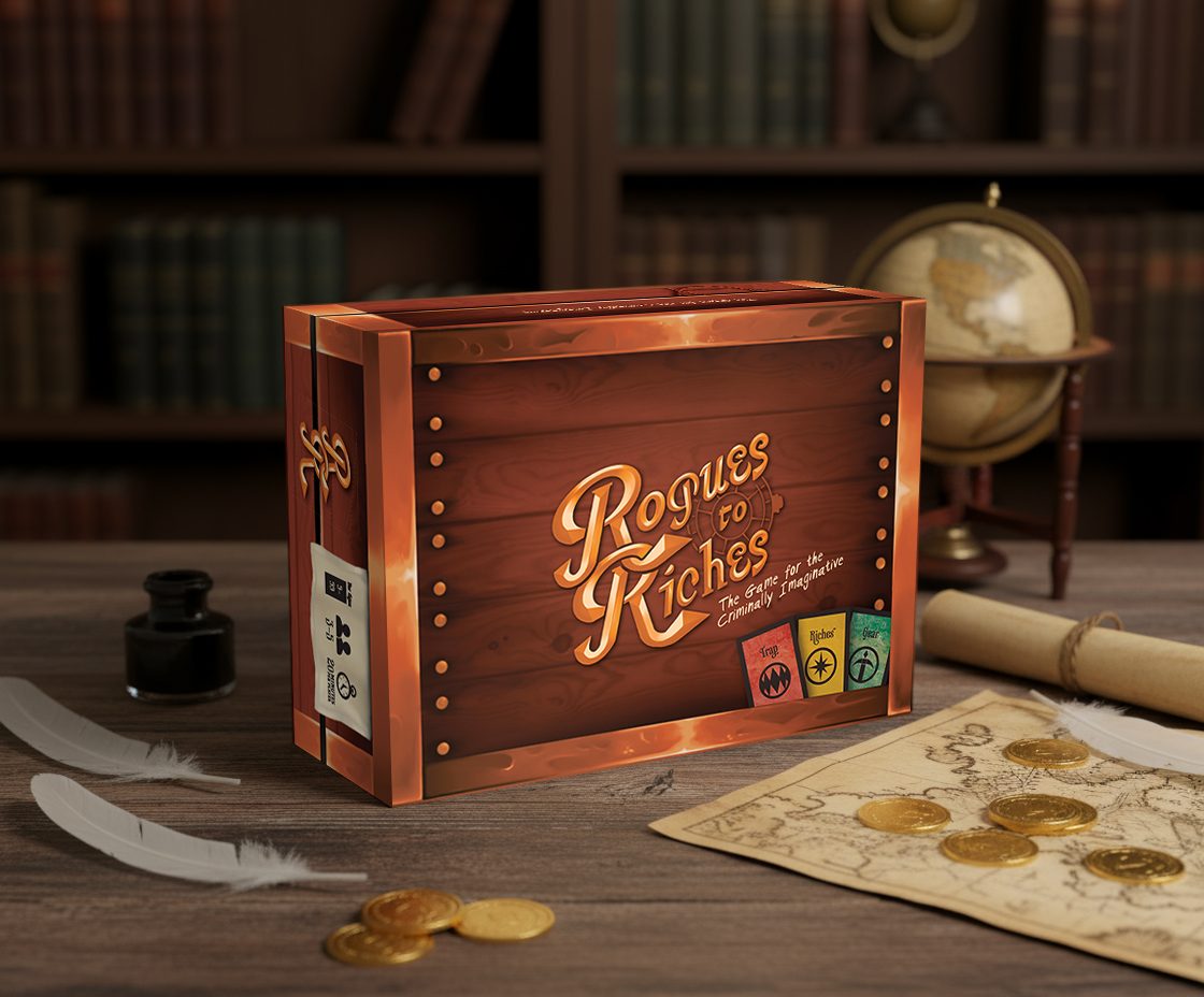 The Rogues to Riches game box on a desk with gold coins, a quill and an old map